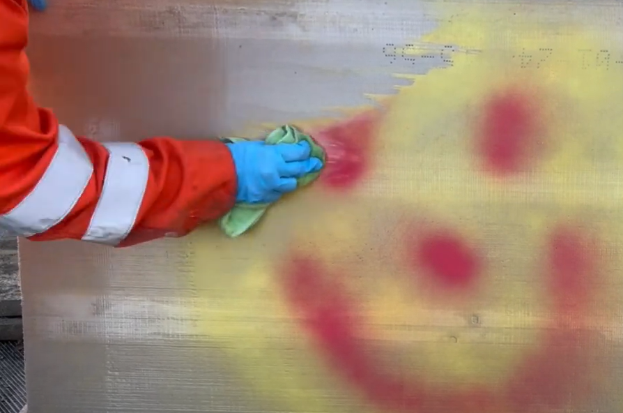 Graffiti over Nitocote AG coating being wiped off