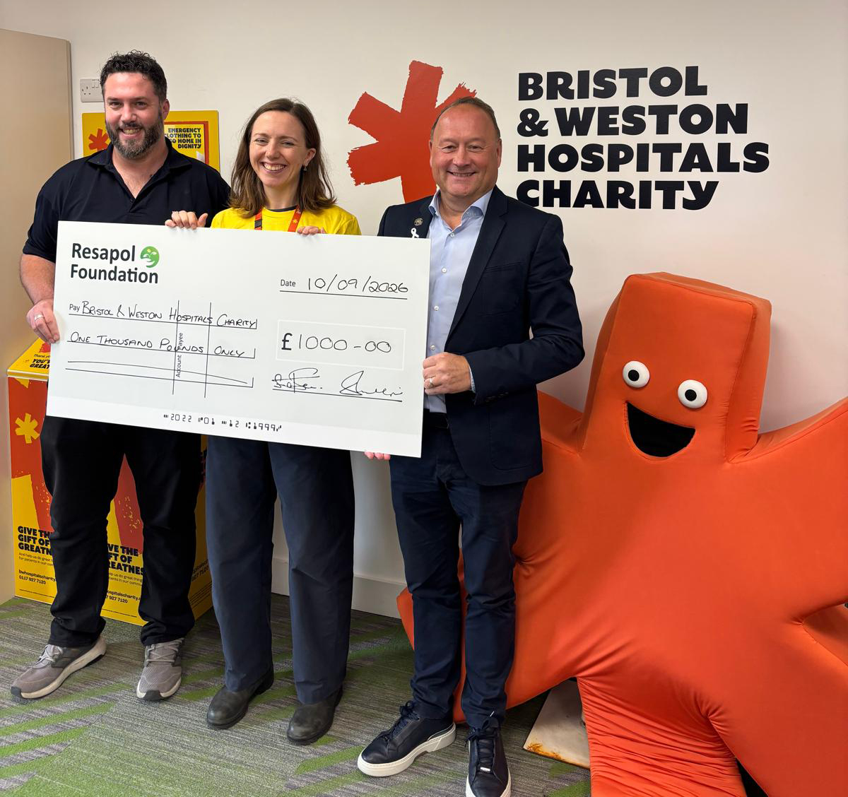 Cheque presentation being made by Resapol's Sean Ofsarnie and James Brown